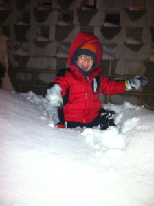 Josiah Nichols playing in the snow