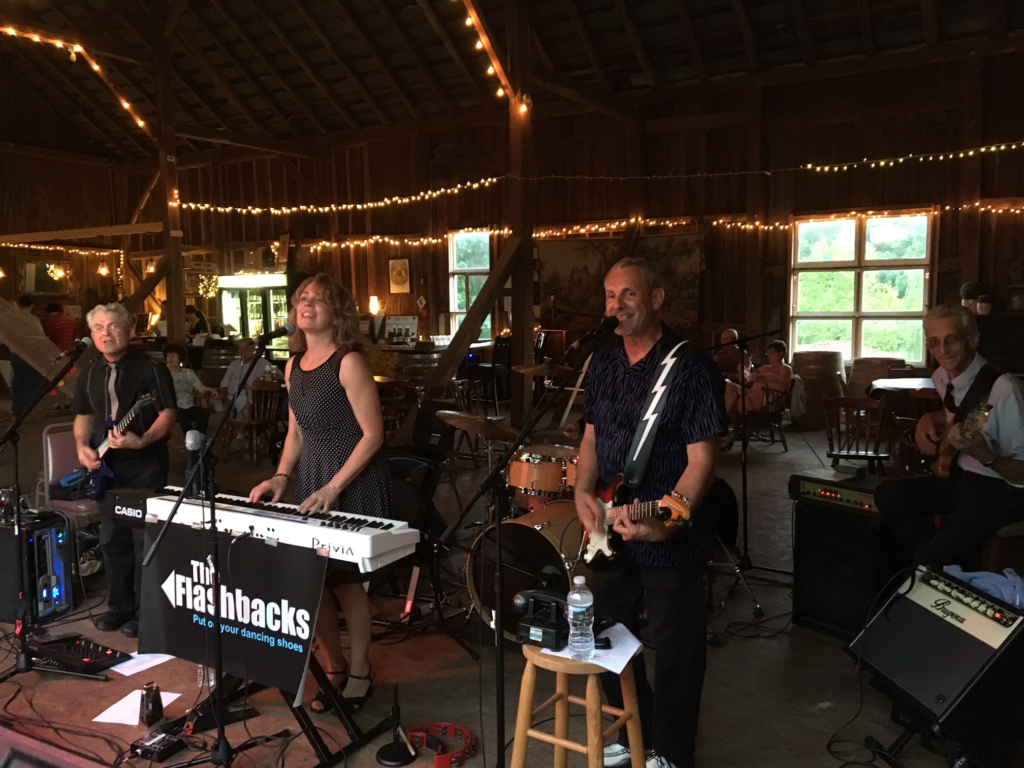 The band, "The Flashbacks," performing at the winery. Photo by Jenna Kauffman