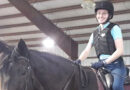Michele Miller riding a horse